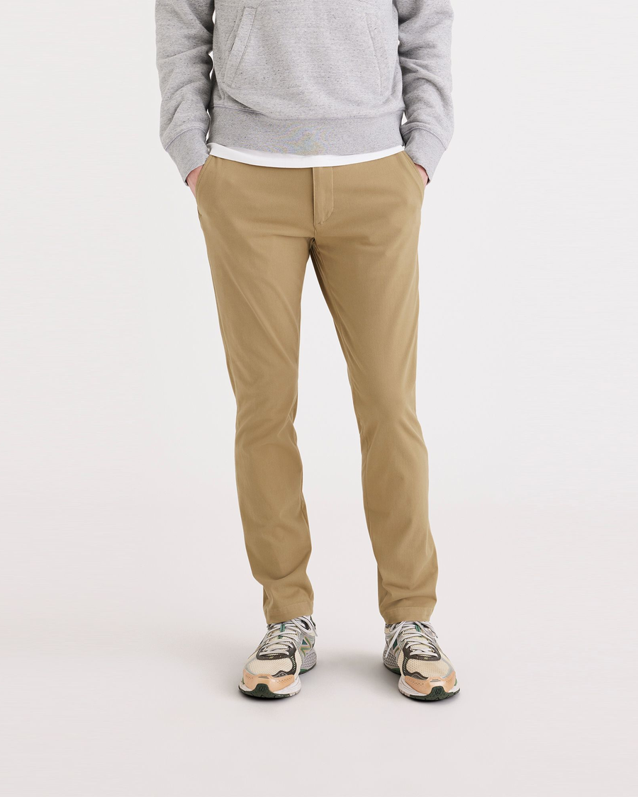 Front view of model wearing Harvest Gold Go Lifestyle Chino, Skinny Fit.