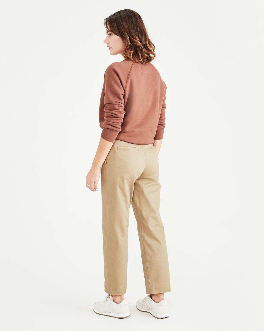 Back view of model wearing Harvest Gold Original Chinos, High Waisted, Straight Fit.