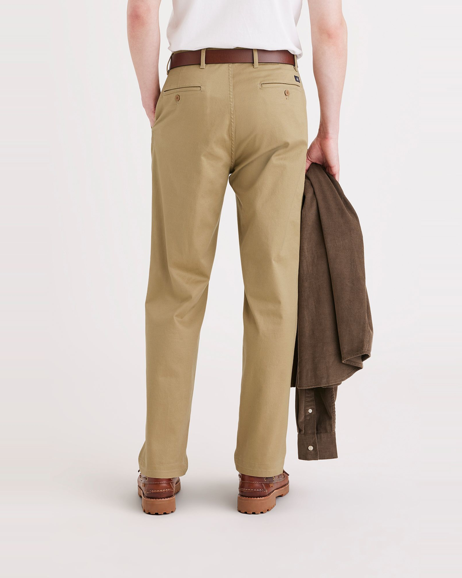 Back view of model wearing Harvest Gold Original Chinos, Relaxed Tapered Fit.