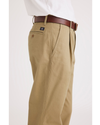 Side view of model wearing Harvest Gold Original Chinos, Relaxed Tapered Fit.