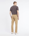 Back view of model wearing Harvest Gold Original Chinos, Slim Fit.