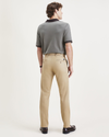 Back view of model wearing Harvest Gold Original Chinos, Slim Fit.