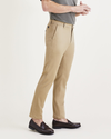 Side view of model wearing Harvest Gold Original Chinos, Slim Fit.