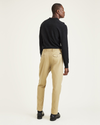 Back view of model wearing Harvest Gold Original Khakis, Relaxed Fit.