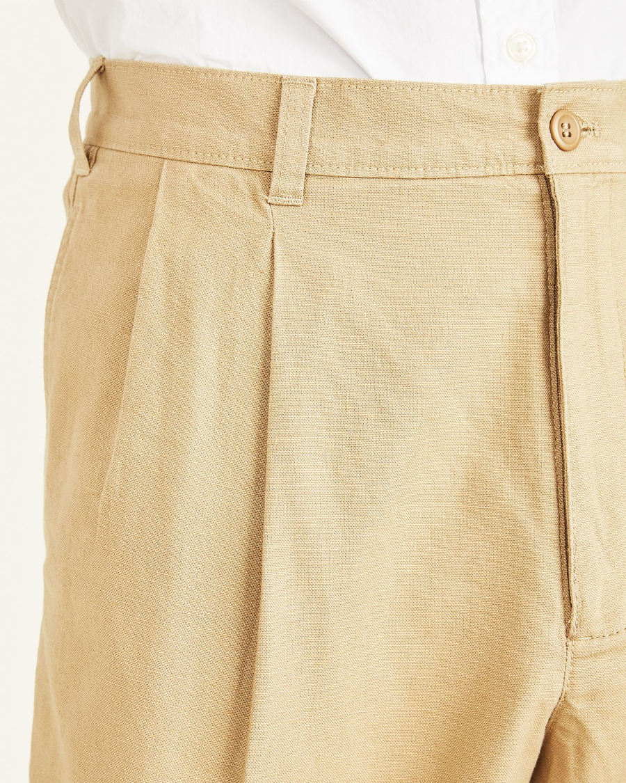 View of model wearing Harvest Gold Original Shorts, Pleated.