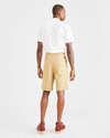 Back view of model wearing Harvest Gold Original Shorts, Pleated.