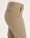 Side view of model wearing Harvest Gold Weekend Chino, Slim Fit.