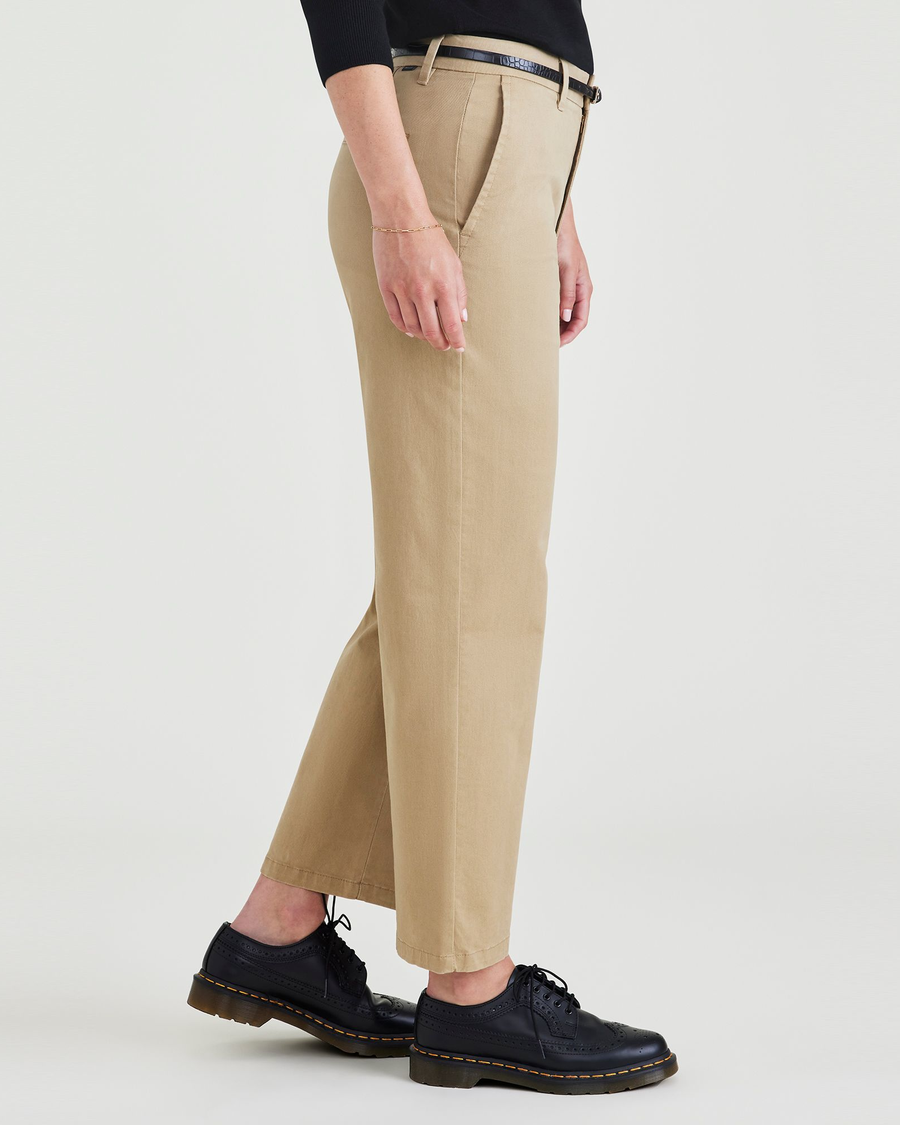 Side view of model wearing Harvest Gold Weekend Chinos, High Straight Fit.