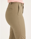 Side view of model wearing Harvest Gold Weekend Chinos, Skinny Fit.