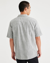 Back view of model wearing High Rise Camp Collar Shirt, Regular Fit.