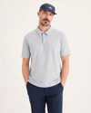 Front view of model wearing High-Rise Go Raglan Polo, Regular Fit.