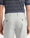 View of model wearing High-Rise Signature Iron Free Khakis, Classic Fit with Stain Defender®.