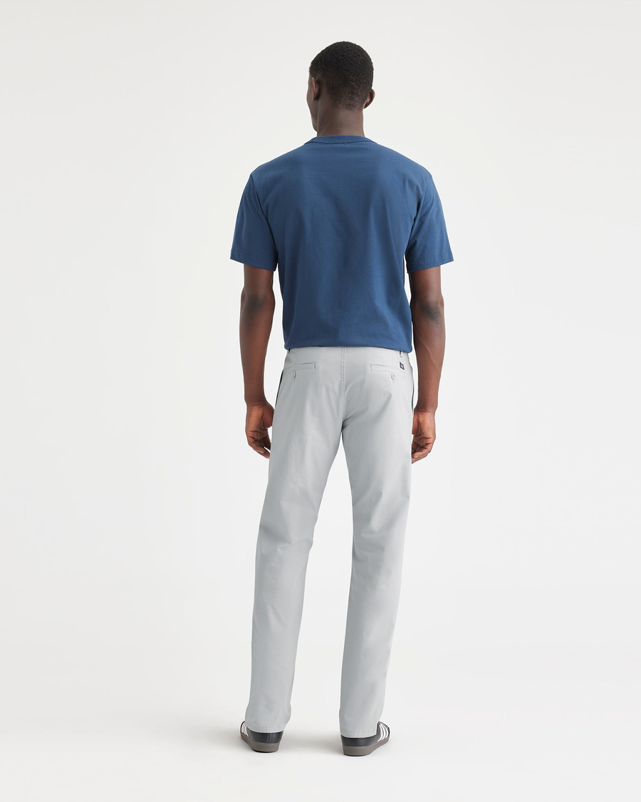 Back view of model wearing High Rise Ultimate Chinos, Athletic Fit.