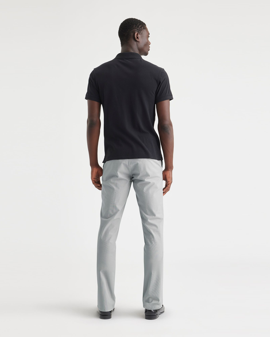 Back view of model wearing High Rise Ultimate Chinos, Slim Fit.