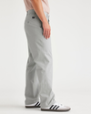 Side view of model wearing High Rise Ultimate Chinos, Straight Fit.