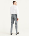 Back view of model wearing High-Rise Workday Khakis, Slim Fit.