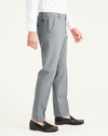 Side view of model wearing High-Rise Workday Khakis, Slim Fit.