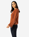 Side view of model wearing Hot Chocolate Bell Sleeve Sweater.