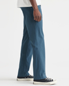 Side view of model wearing Indian Teal California Khakis, Straight Fit.