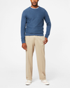 View of model wearing Khaki Comfort Khakis, Pleated, Relaxed Fit.