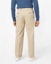 View of model wearing Khaki Comfort Khakis, Pleated, Relaxed Fit.
