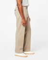 Side view of model wearing Khaki Comfort Khakis, Relaxed Fit.