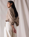 Back view of model wearing Khaki Dockers® x Transnomadica Dock Shirt, Relaxed Fit.
