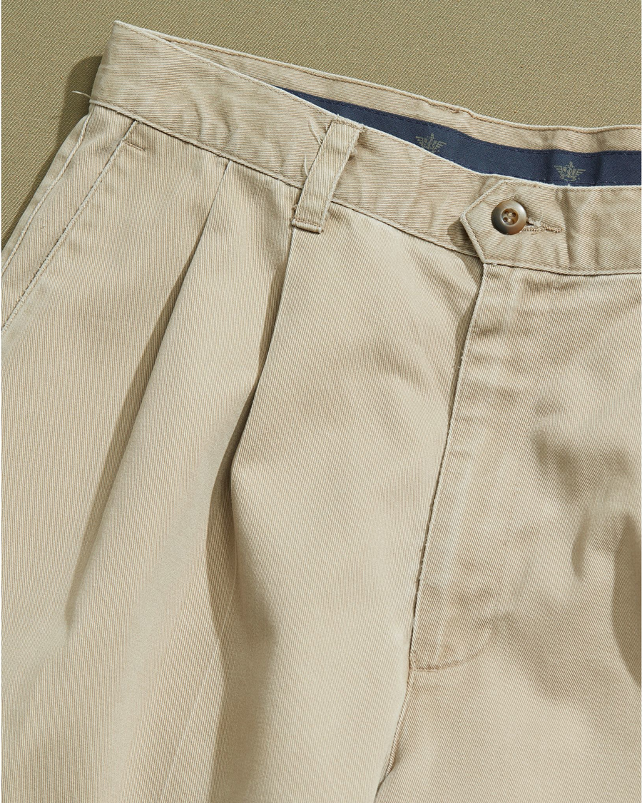 View of model wearing Khaki Double Pleated Khaki Pants - 32 x 28.