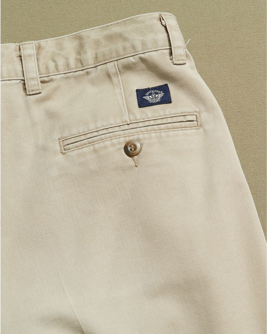 View of model wearing Khaki Double Pleated Khaki Pants - 32 x 28.