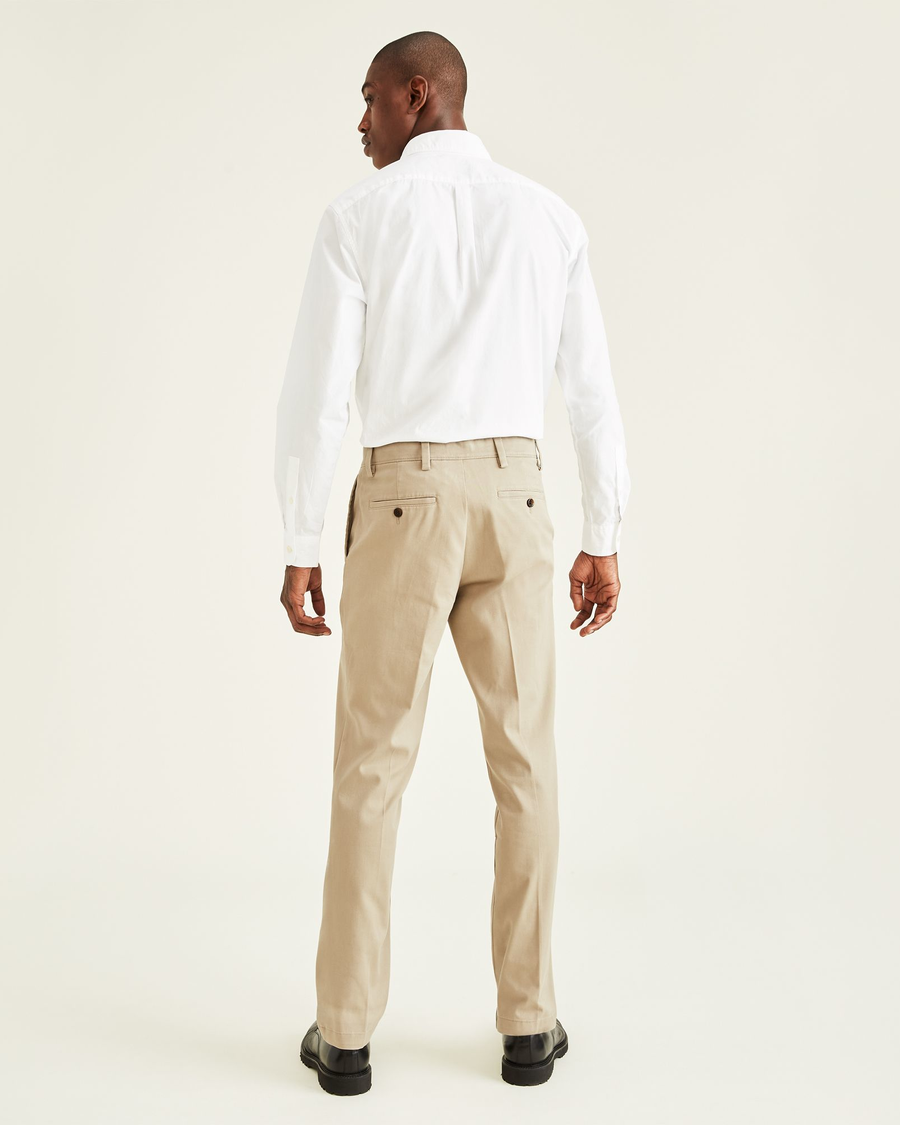 Back view of model wearing Khaki Easy Khakis, Straight Fit.