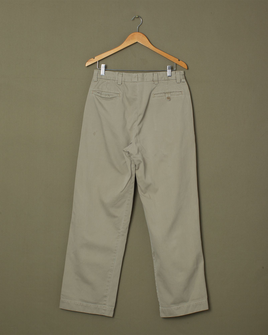 Back view of model wearing Khaki K1 Flat Front Pants, Relaxed Fit - 30x31.