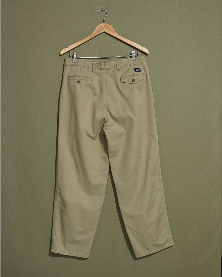 Back view of model wearing Khaki Made in USA, Double Pleated Khaki Pants - 32 x 28.