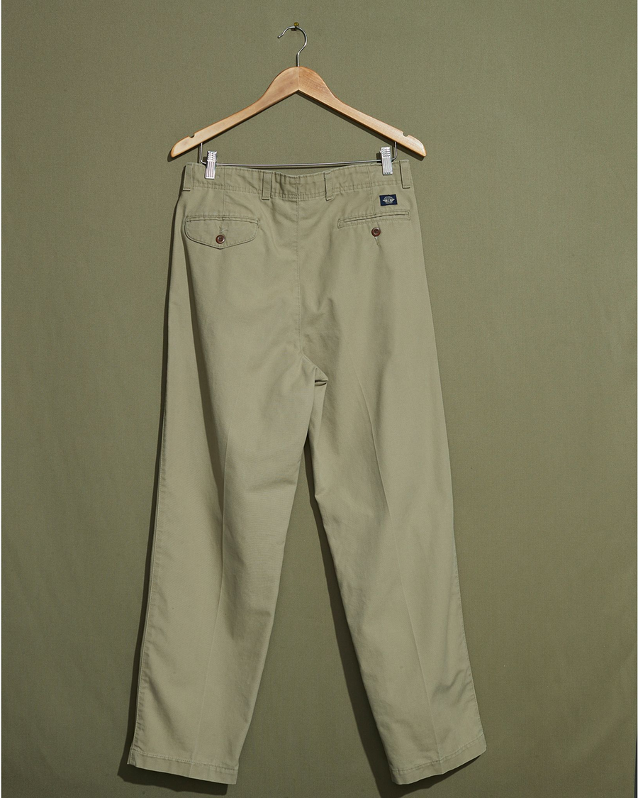 Back view of model wearing Khaki Made in USA, Double Pleated Khaki Pants - 32 x 30.