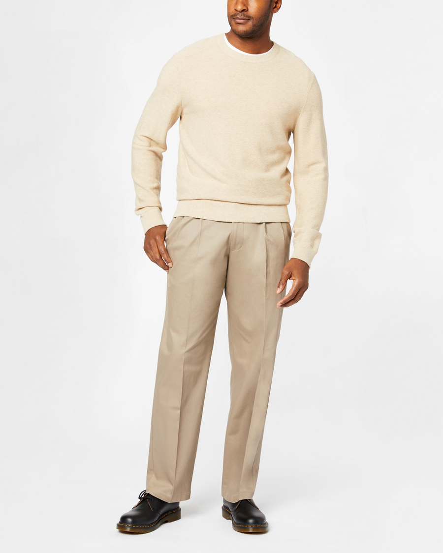 Front view of model wearing Khaki Signature Khakis, Pleated, Relaxed Fit.