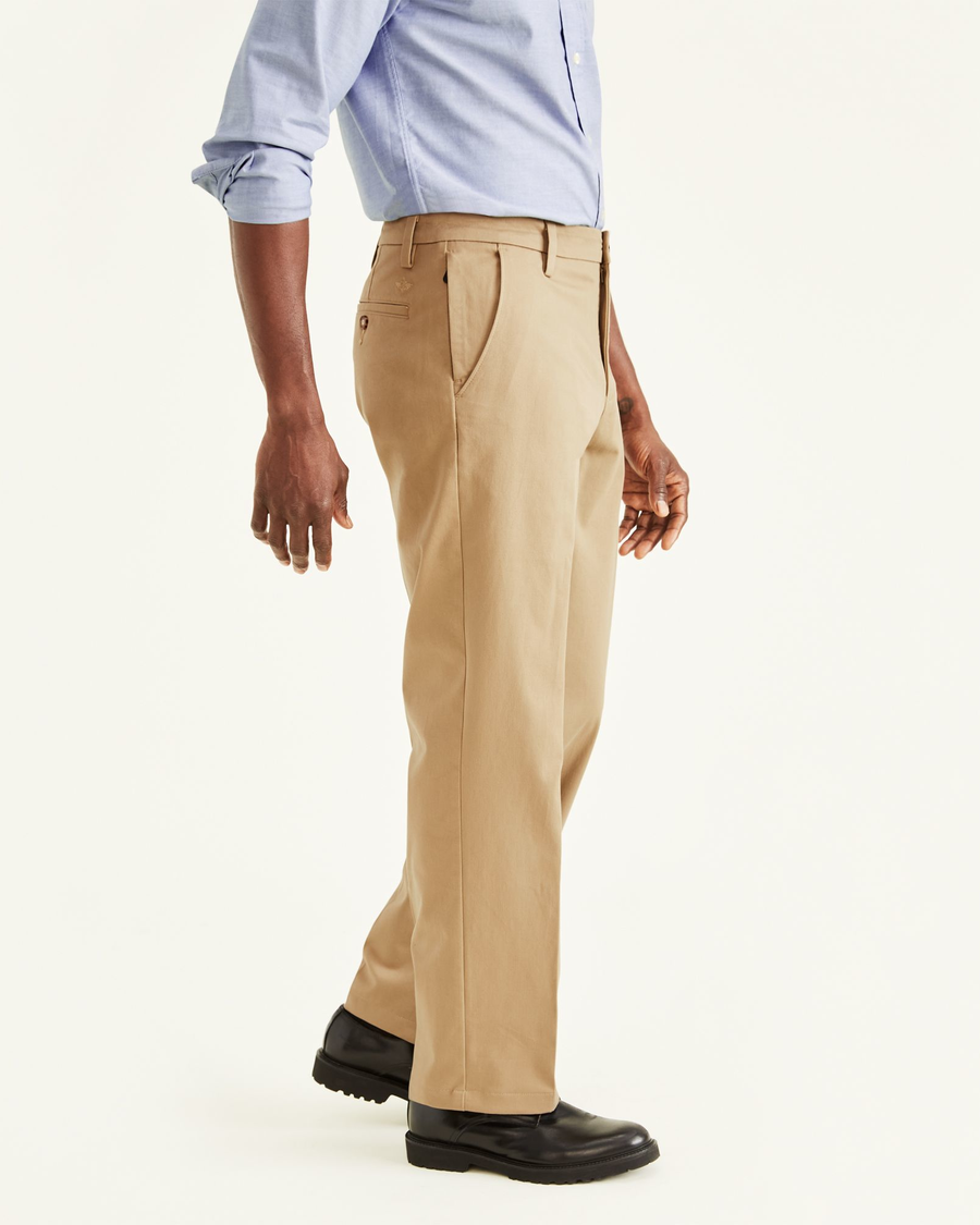 Side view of model wearing Khaki Workday Khakis, Classic Fit.