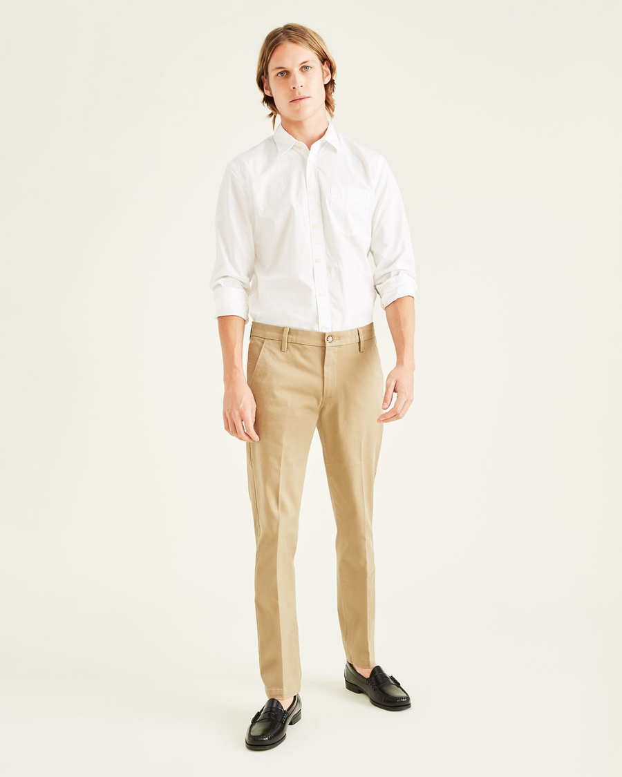 Front view of model wearing Khaki Workday Khakis, Slim Fit.