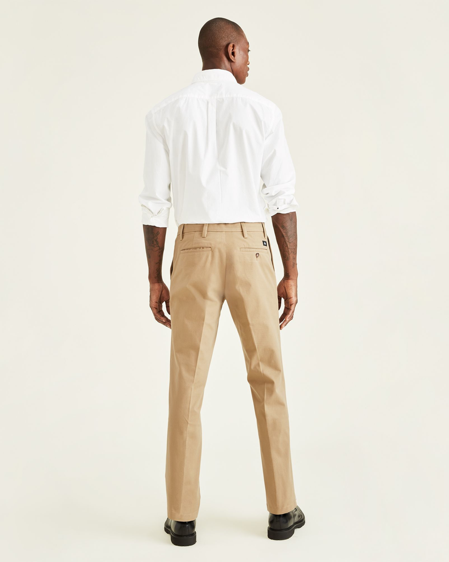 Back view of model wearing Khaki Workday Khakis, Straight Fit.