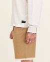 Side view of model wearing Light Heather Grey Dandois x Dockers® Mockneck Sweatshirt.