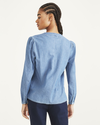 Back view of model wearing Light Wash Chambray Woven V-Neck Shirt, Regular Fit.