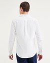 Back view of model wearing Light White Rigid Original Button-Up, Slim Fit.