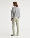 Back view of model wearing Lint Original Chinos, Slim Fit.