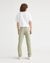 Back view of model wearing Lint Ultimate Chinos, Slim Fit.