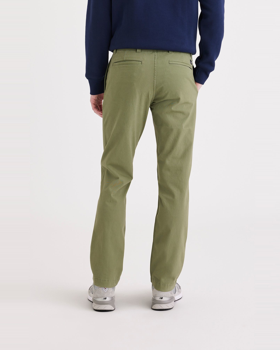 Back view of model wearing Loden Green Alpha Chino, Slim Fit.