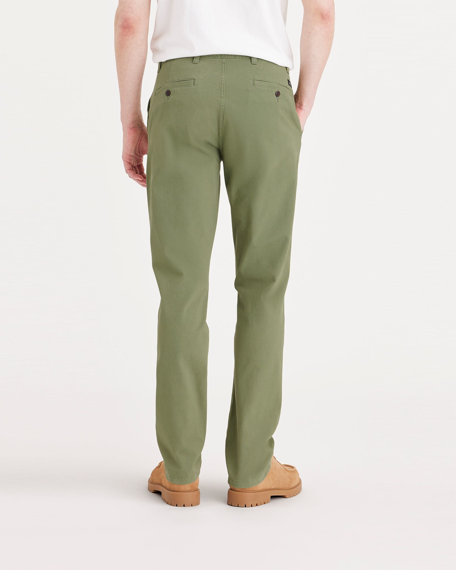 Back view of model wearing Loden Green Ultimate Chino, Slim Fit.