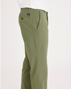 Side view of model wearing Loden Green Ultimate Chino, Slim Fit.