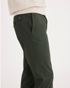 Side view of model wearing Loden Green Ultimate Chino, Slim Fit.