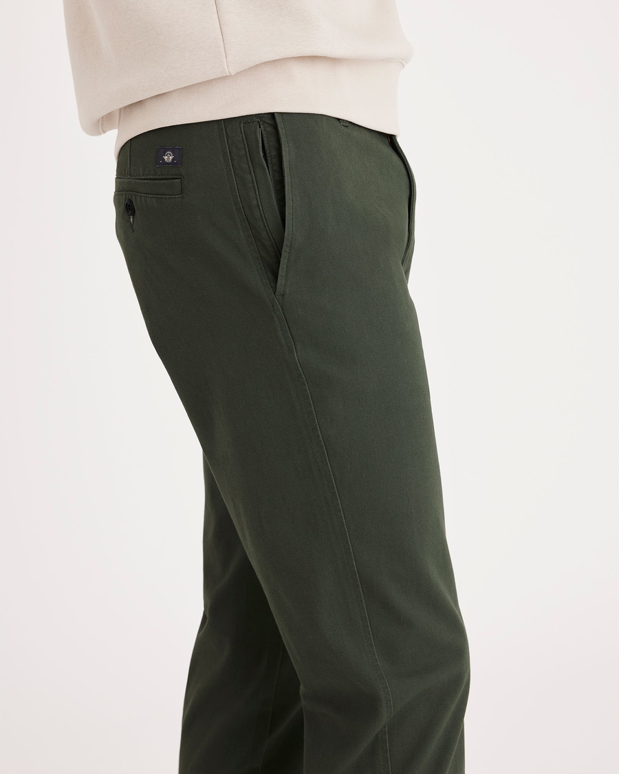 Side view of model wearing Loden Green Ultimate Chino, Slim Fit.