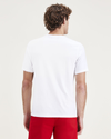 Back view of model wearing Lucent White 1986 Groove Graphic Tee, Slim Fit.