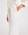 View of model wearing Lucent White Carpenter Pant, Straight Fit.