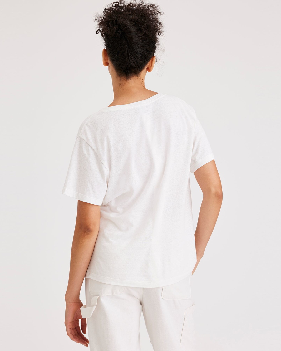 Back view of model wearing Lucent White Deep V-Neck Tee, Regular Fit.
